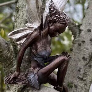 Elf Sitting Resin Figurine Silvery Wings & Curls in Her Hair, Bronze Color Body